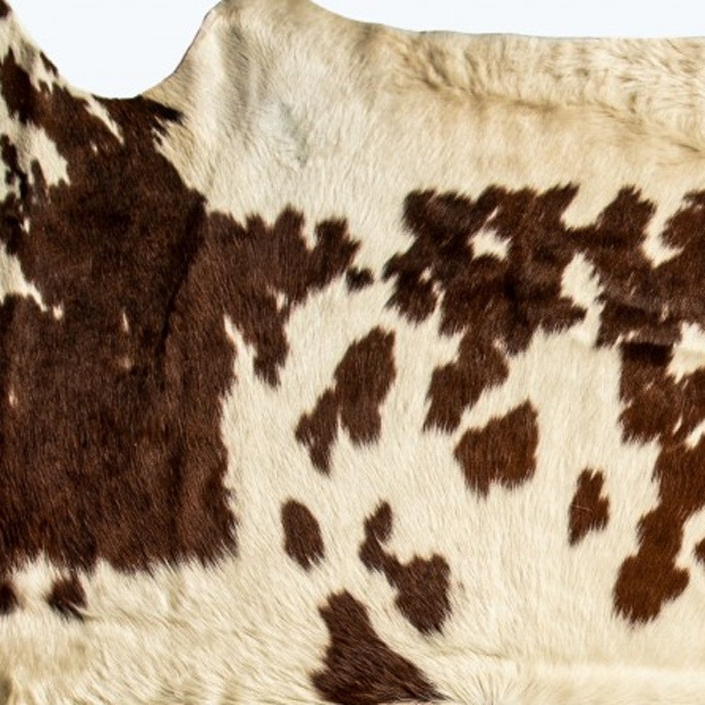 72" X 84" White And Brown Cowhide  Rug