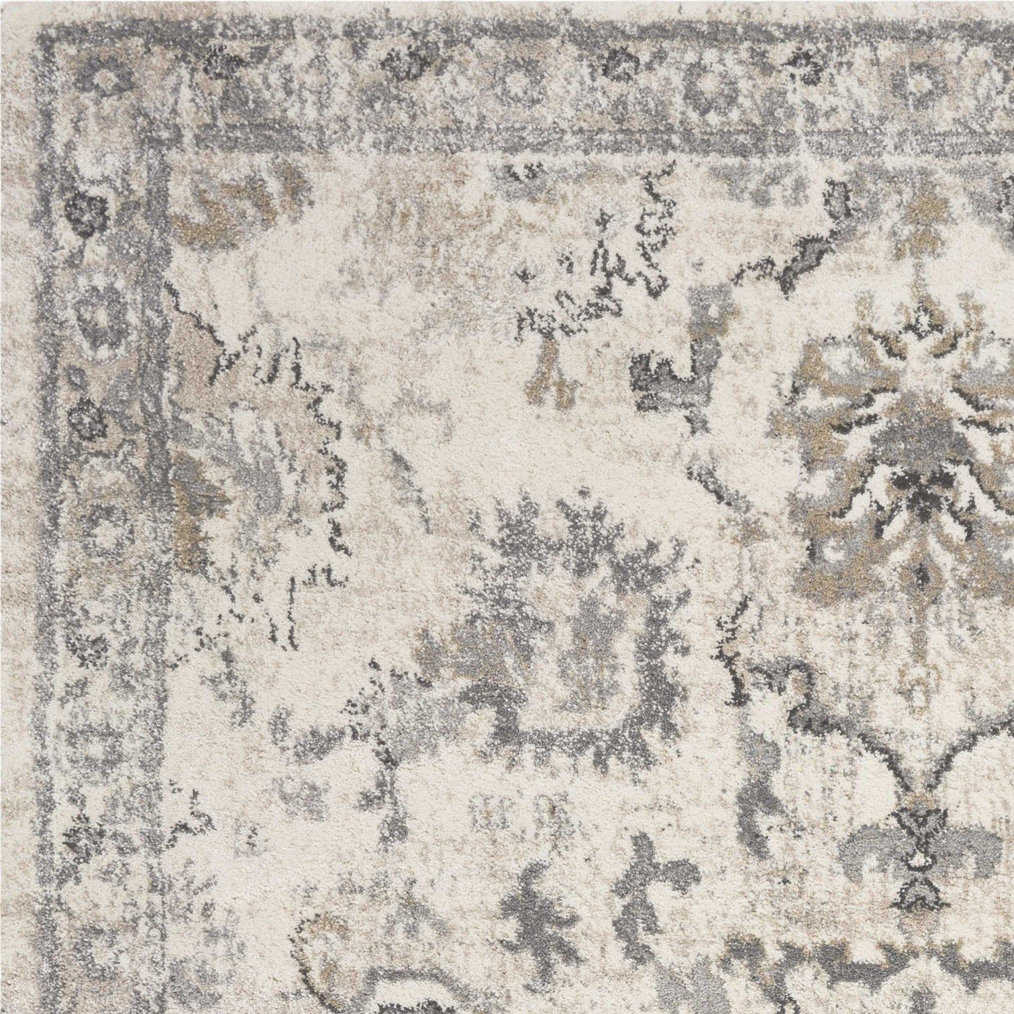 9'X13' Ivory Machine Woven Distressed Floral Traditional Indoor Area Rug