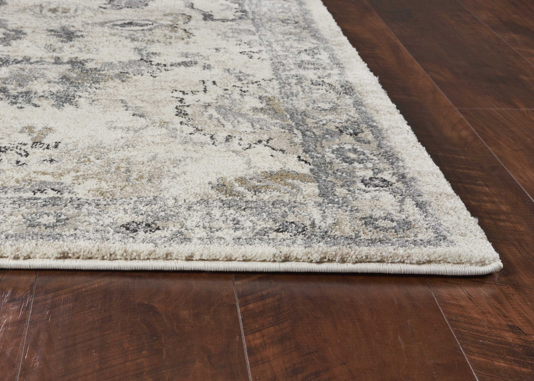 9'X13' Ivory Machine Woven Distressed Floral Traditional Indoor Area Rug