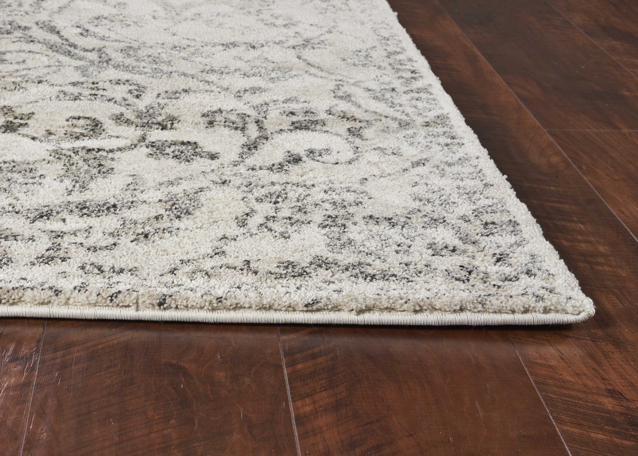 9'X13' Ivory Machine Woven Distressed Floral Vines Indoor Area Rug