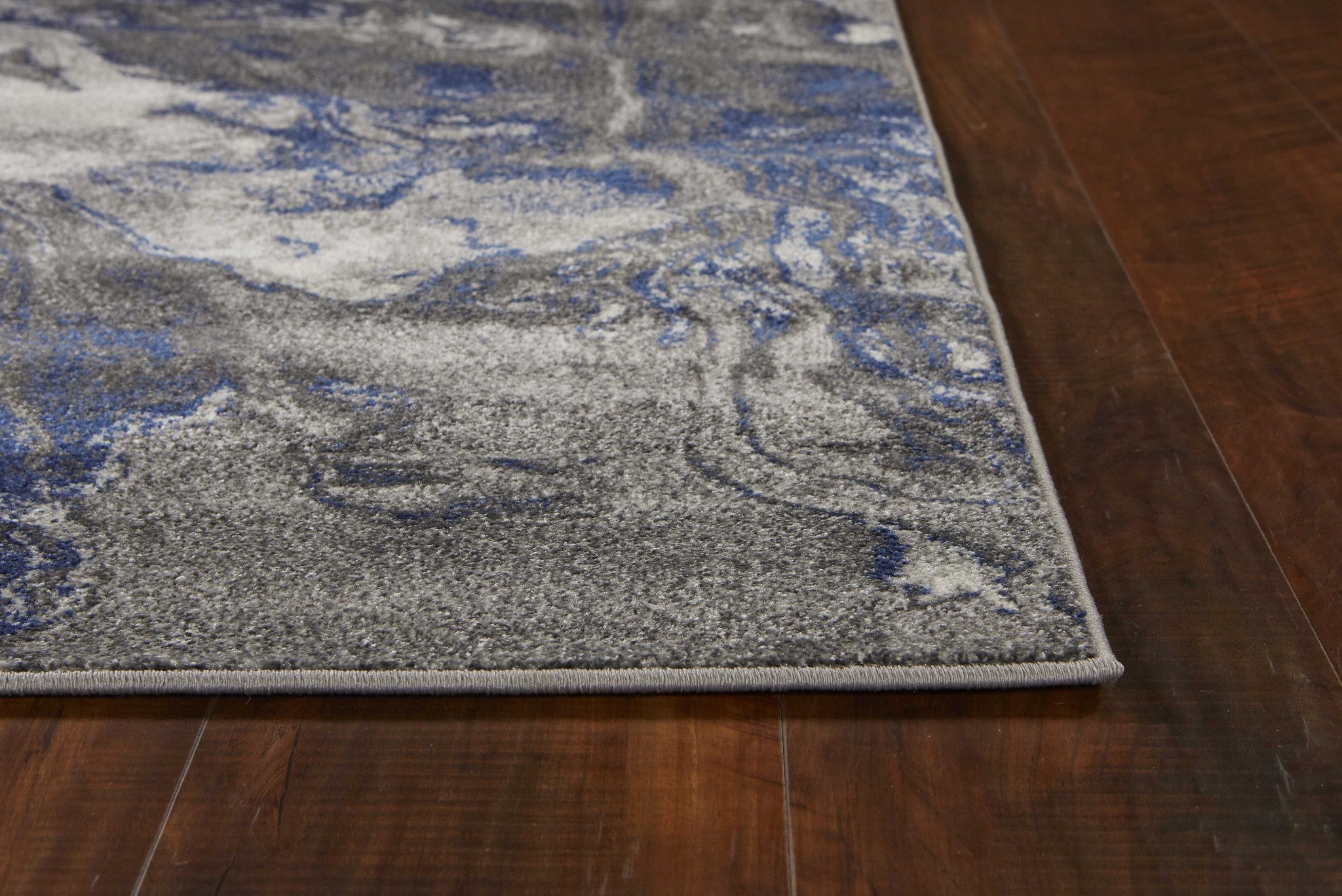 5'X8' Grey Machine Woven Abstract Watercolor Indoor Area Rug