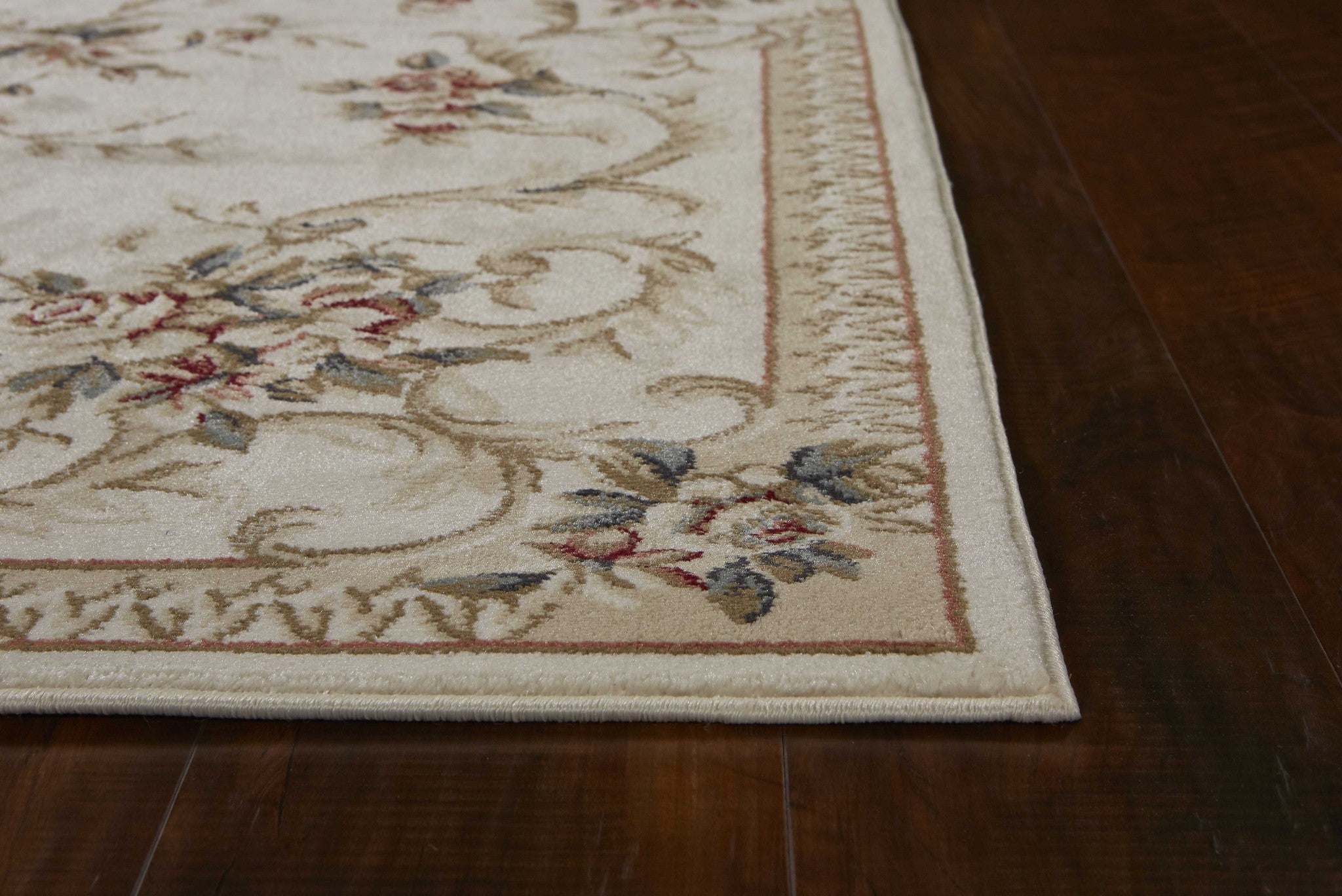 5'X8' Ivory Bordered Floral Indoor Area Rug