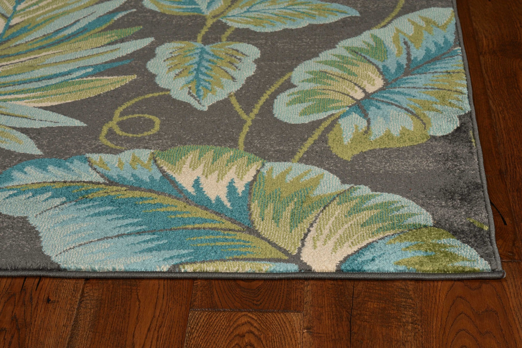 5'X8' Grey Teal Machine Woven Tropical Indoor Area Rug