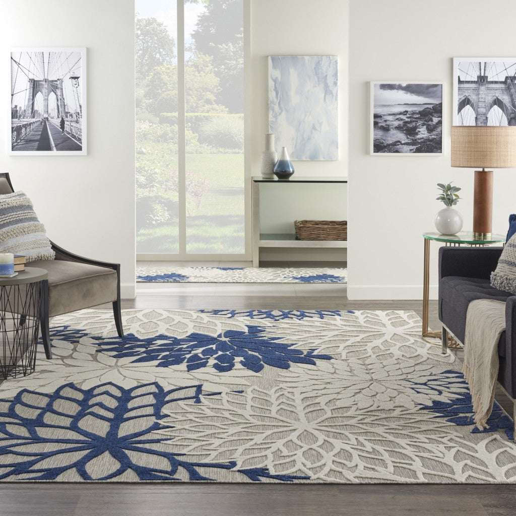 7' X 10' Ivory And Blue Floral Indoor Outdoor Area Rug