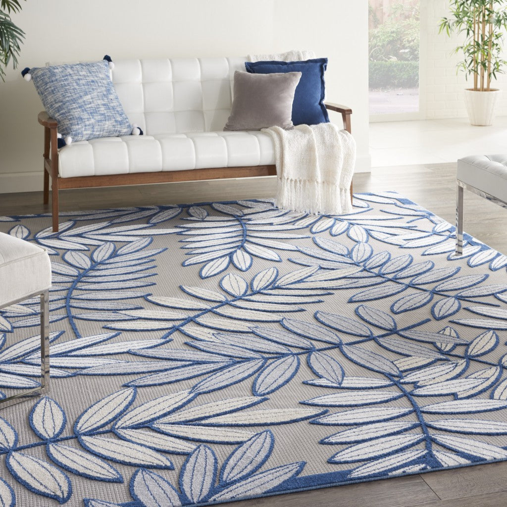 7' X 10' Ivory And Blue Floral Indoor Outdoor Area Rug