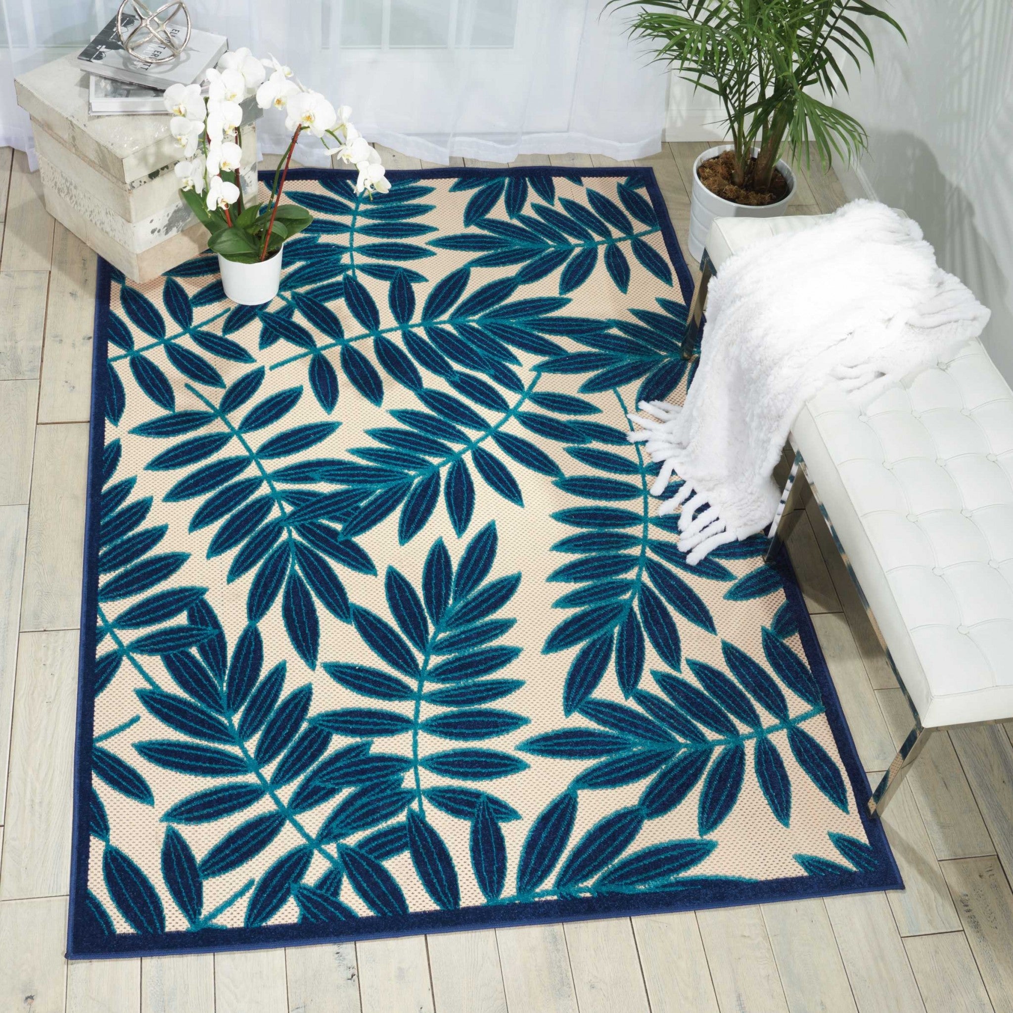 5' X 8' Blue And Ivory Floral Indoor Outdoor Area Rug