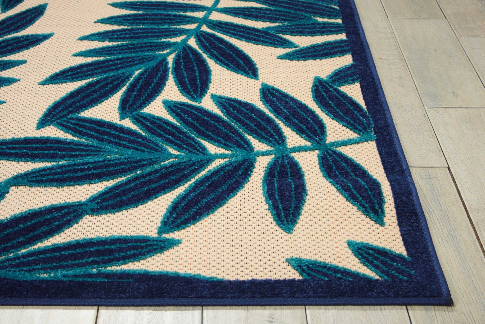 5' X 8' Blue And Ivory Floral Indoor Outdoor Area Rug