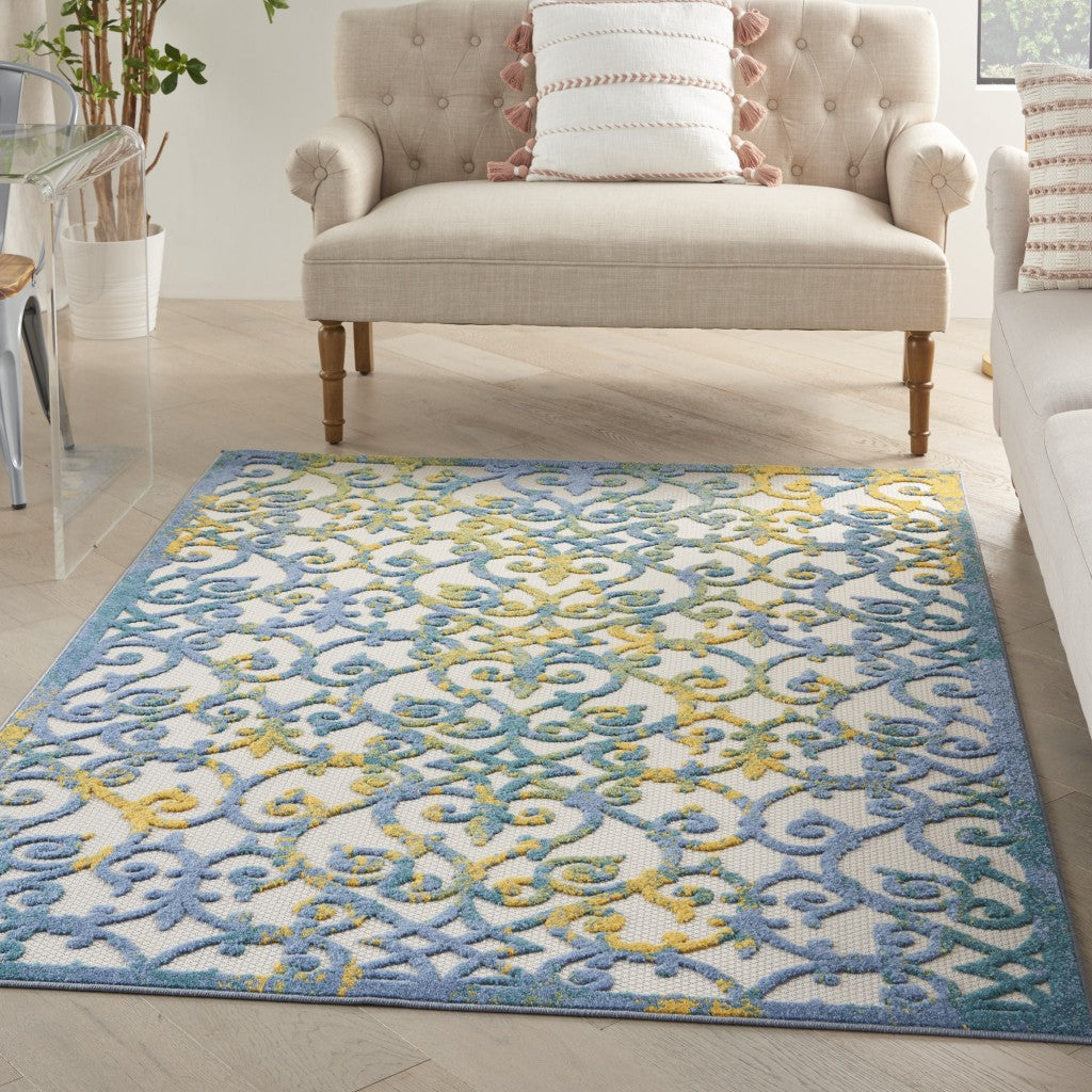 6' X 9' Ivory And Blue Floral Indoor Outdoor Area Rug