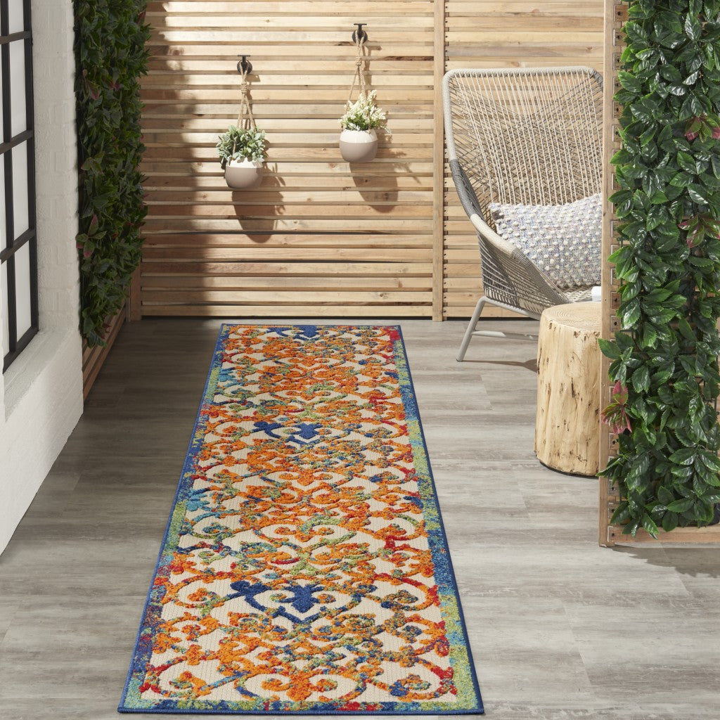 2' X 10' Ivory And Blue Floral Indoor Outdoor Area Rug