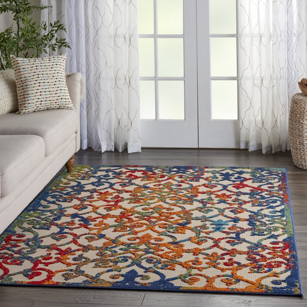 4' X 6' Ivory And Blue Floral Indoor Outdoor Area Rug