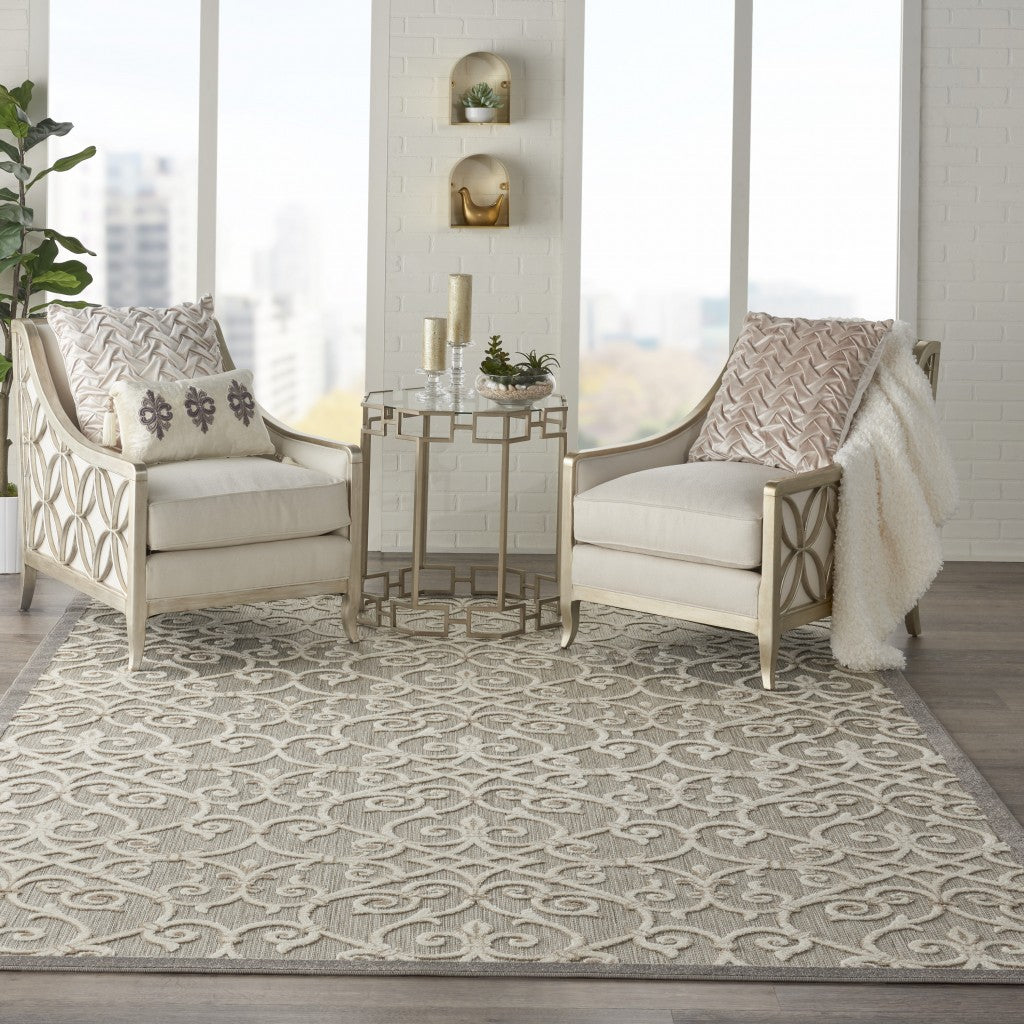 8' X 11' Gray And Ivory Floral Indoor Outdoor Area Rug