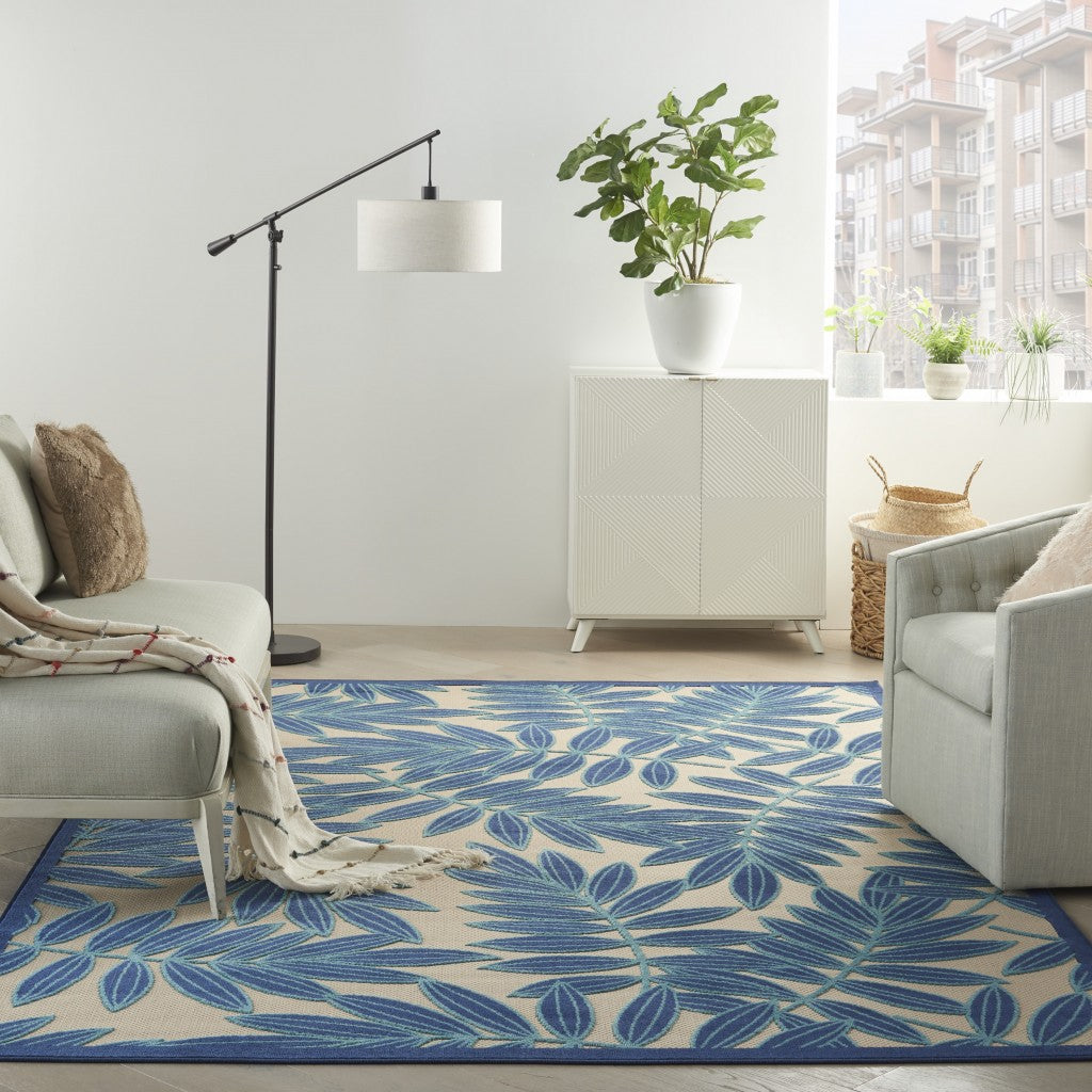 6' X 9' Blue And Ivory Floral Stain Resistant Indoor Outdoor Area Rug