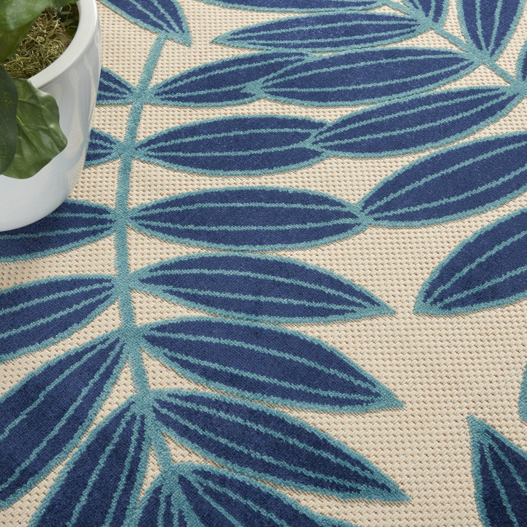 8' Round Blue And Ivory Round Floral Stain Resistant Indoor Outdoor Area Rug