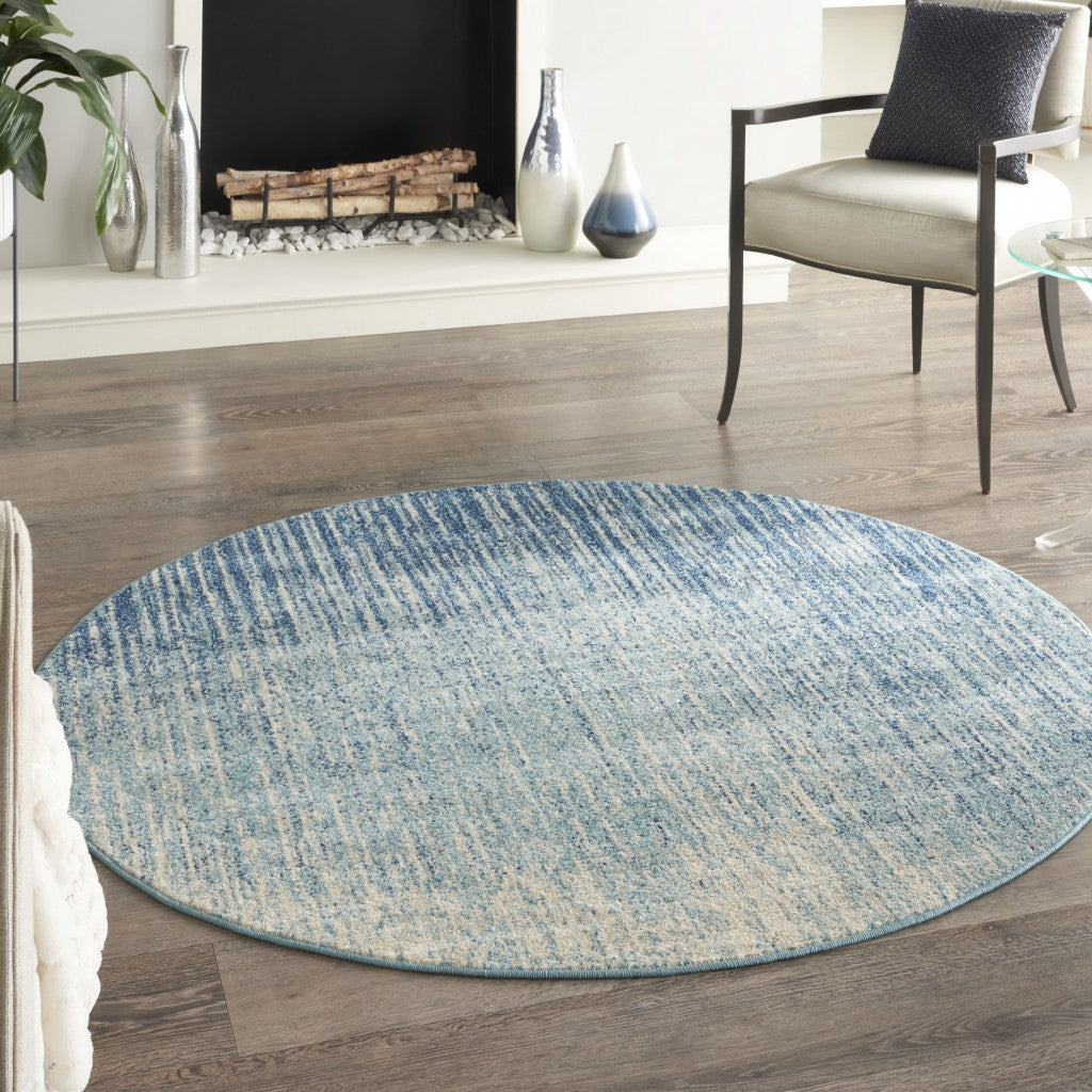 4' Ivory And Blue Round Abstract Power Loom Area Rug