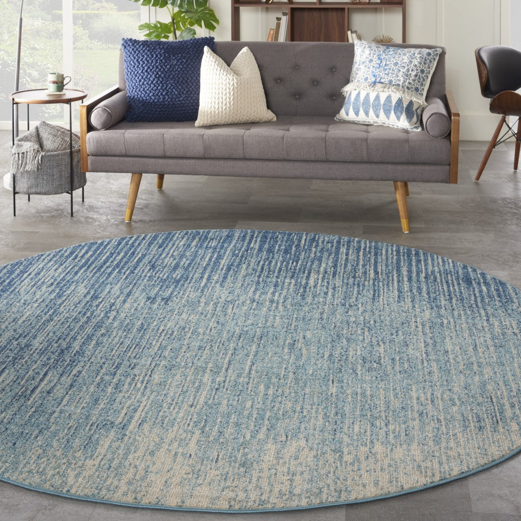 8' Ivory And Blue Round Abstract Power Loom Area Rug