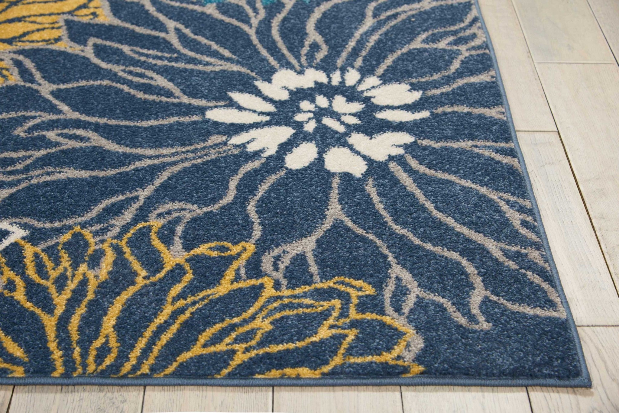 5' X 7' Blue Floral Power Loom Area Rug