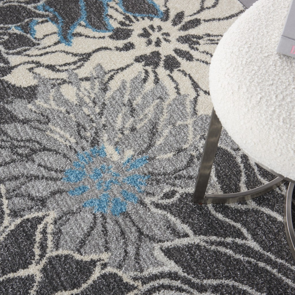 5' X 7' Blue And Gray Floral Power Loom Area Rug