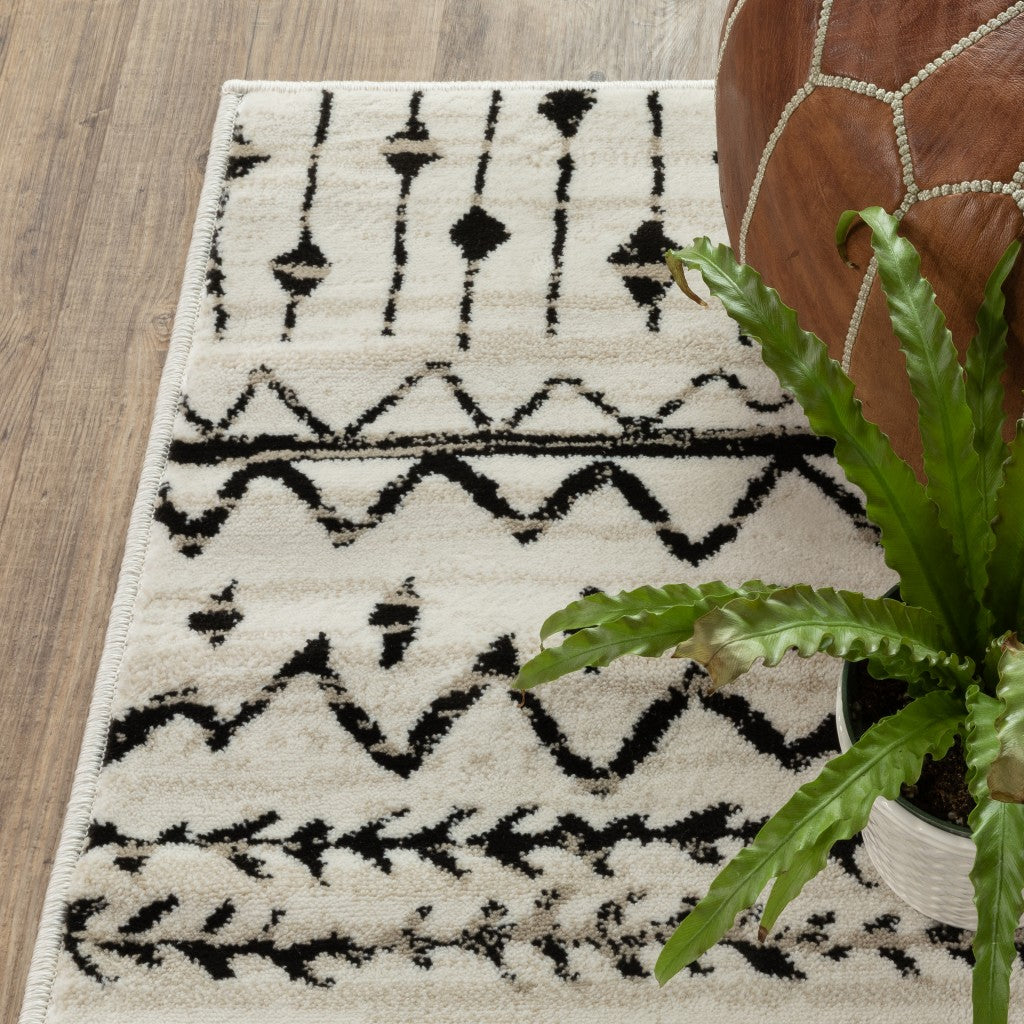 4’ X 6’ Ivory And Black Eclectic Patterns Indoor Area Rug