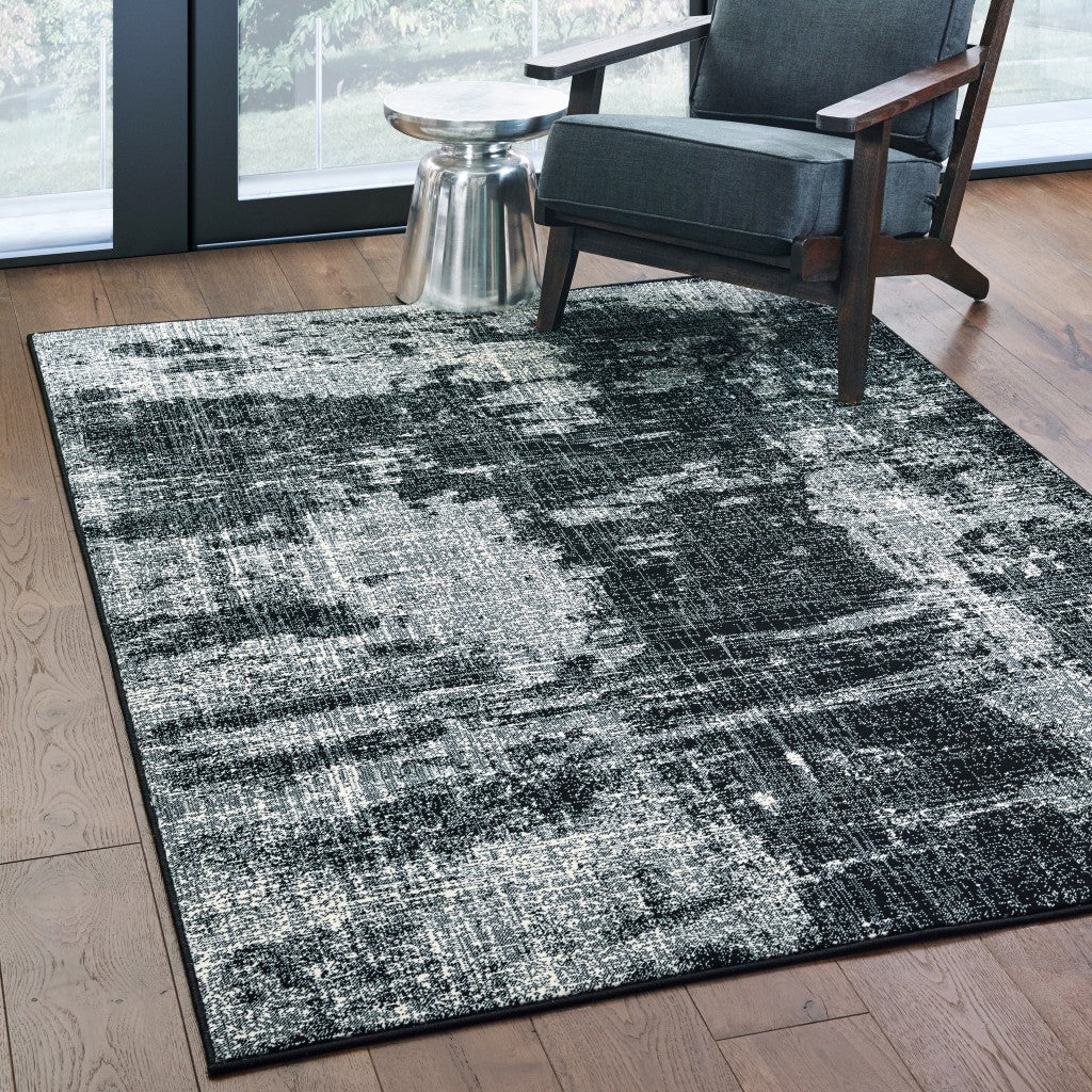 5' X 8' Black Ivory Machine Woven Abstract Indoor Area Rug