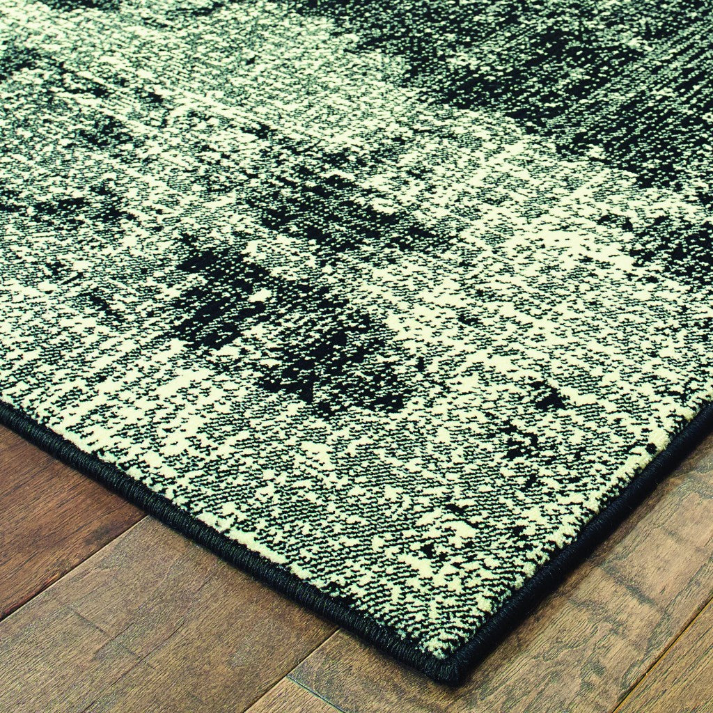 7' X 10' Black Ivory Machine Woven Abstract Indoor Area Rug