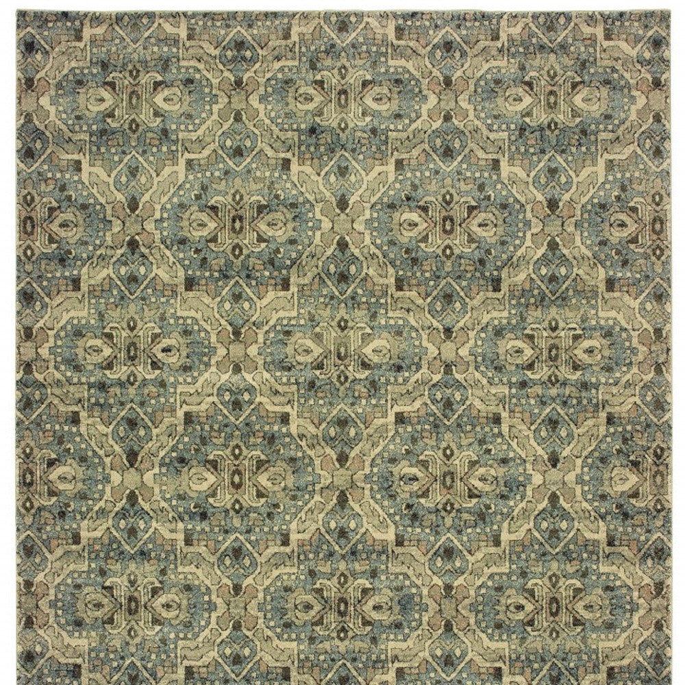 5’X8’ Ivory And Blue Geometric Area Rug