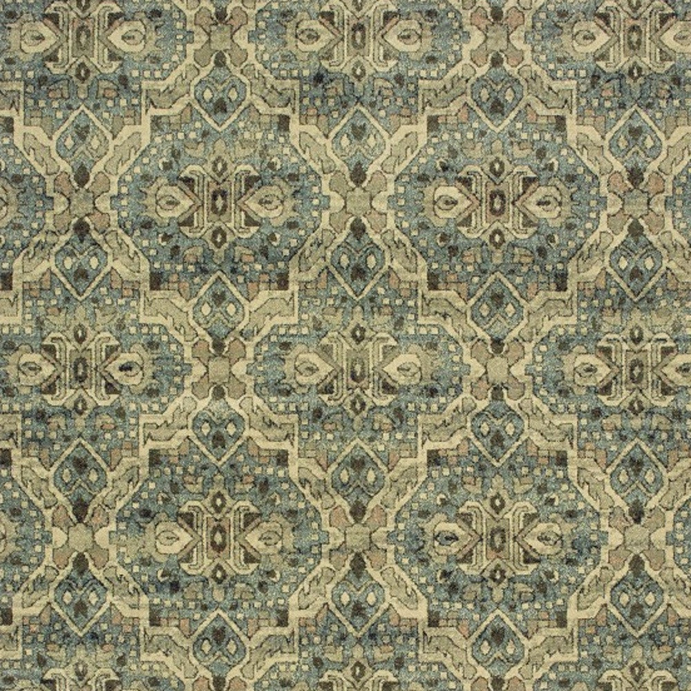 8’X11’ Ivory And Blue Geometric Area Rug