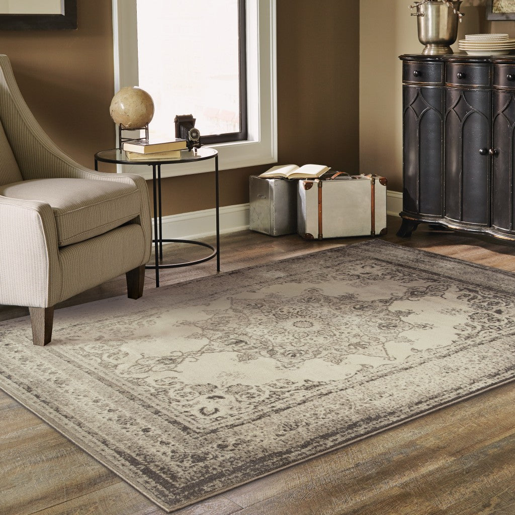 5’X8’ Ivory And Gray Pale Medallion Area Rug