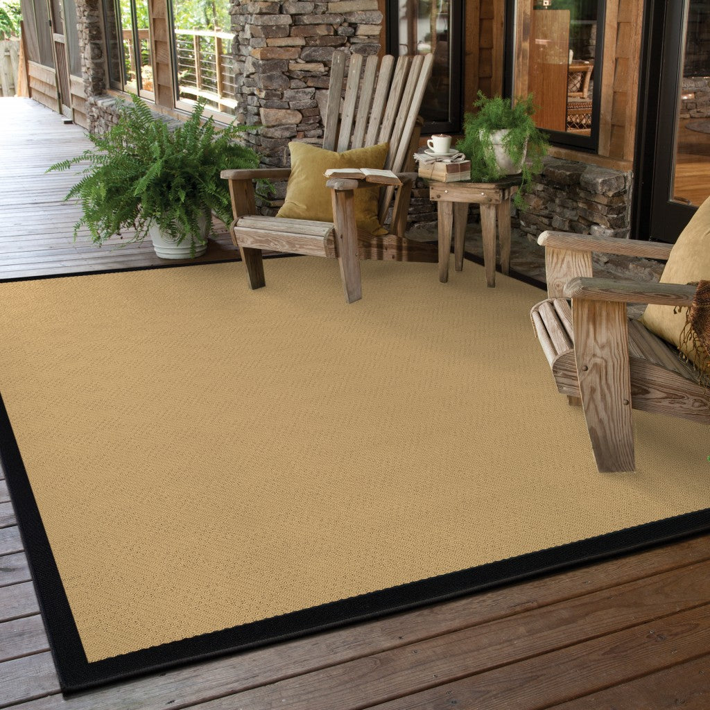 6' x 9' Beige and Black Indoor Outdoor Area Rug