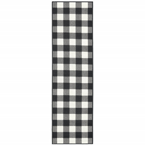 2' X 8' Black and Ivory Indoor Outdoor Area Rug