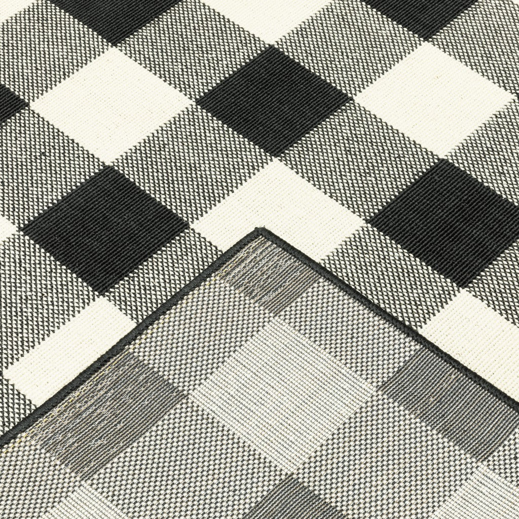 5' x 8' Black and Ivory Indoor Outdoor Area Rug