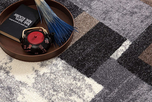 4’ X 6’ Brown Distressed Geometric Area Rug