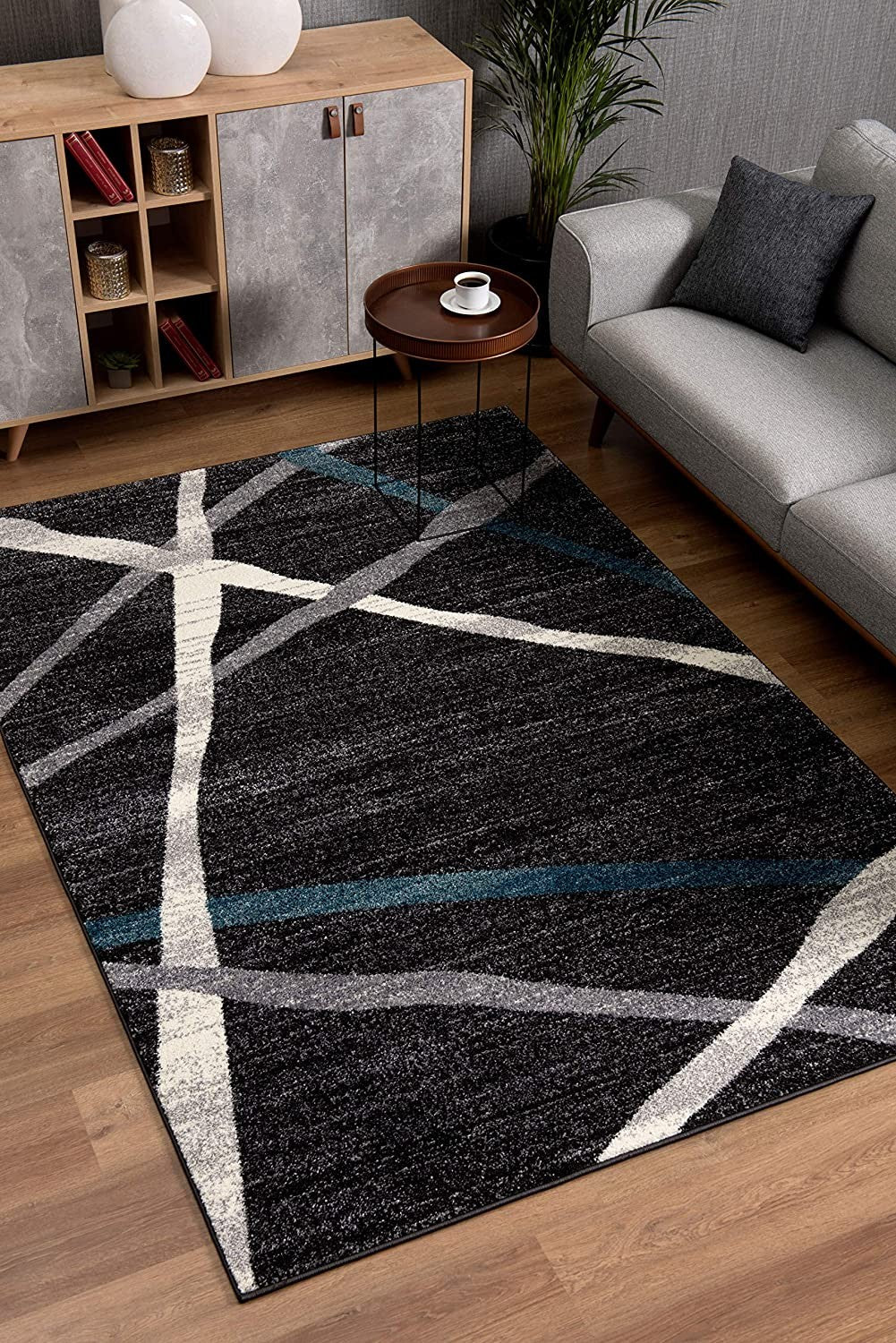 8’ X 11’ Distressed Black And Gray Abstract Area Rug