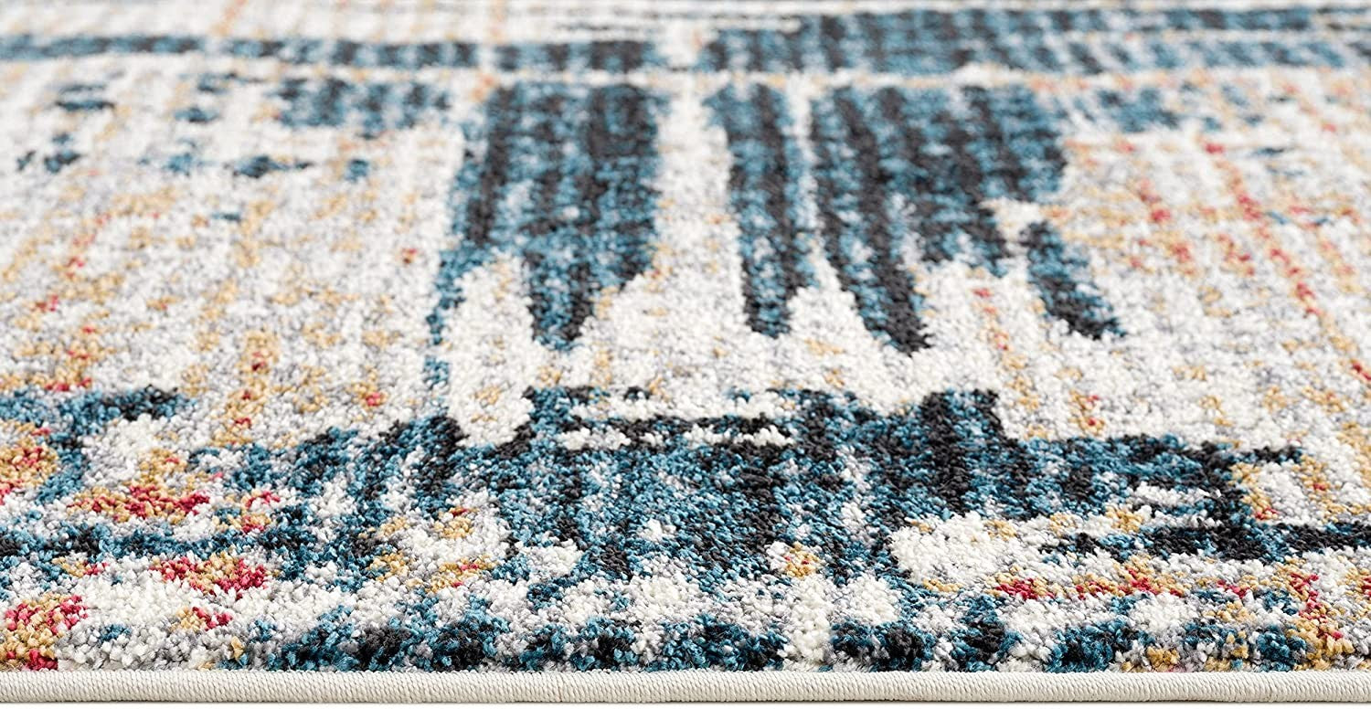 4' X 6' Blue And Ivory Abstract Area Rug