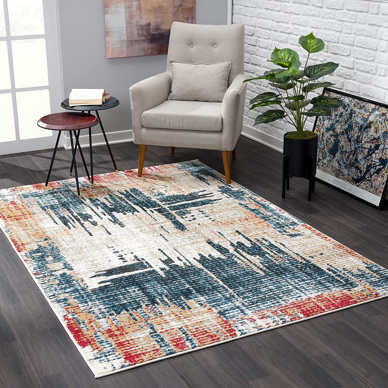 7' X 9' Blue And Ivory Abstract Area Rug