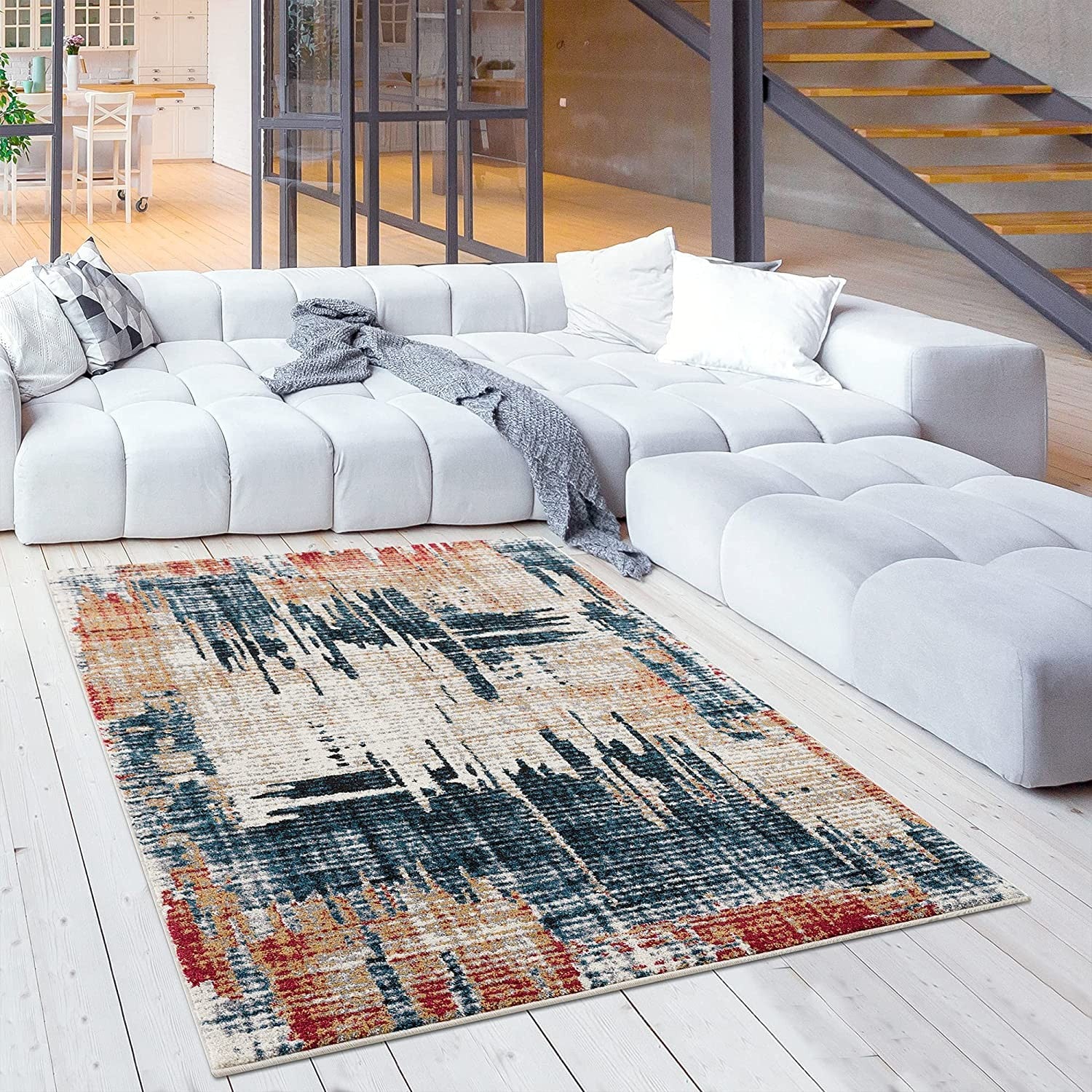 7' X 9' Blue And Ivory Abstract Area Rug