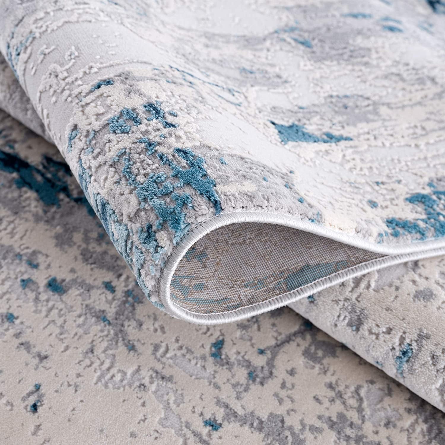 5’ X 8’ Blue And Ivory Abstract Strokes Area Rug