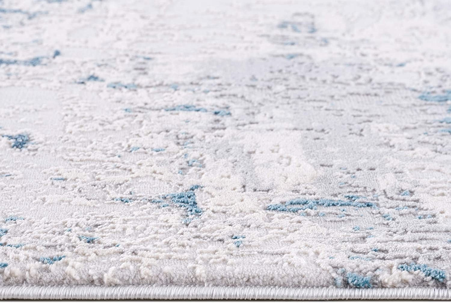 5’ X 8’ Blue And Ivory Abstract Strokes Area Rug