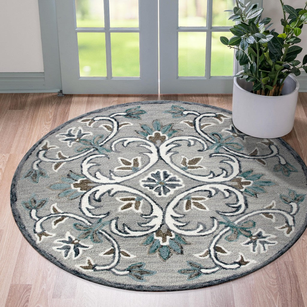 6’ Round Gray and White Filigree Area Rug