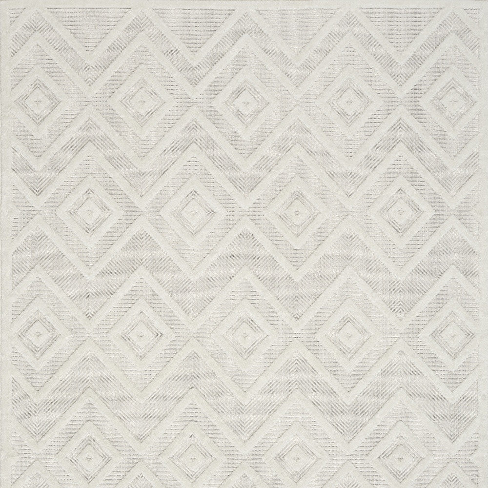 5' X 7' Ivory And White Argyle Indoor Outdoor Area Rug