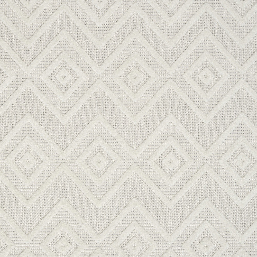 6' X 9' Ivory And White Argyle Indoor Outdoor Area Rug