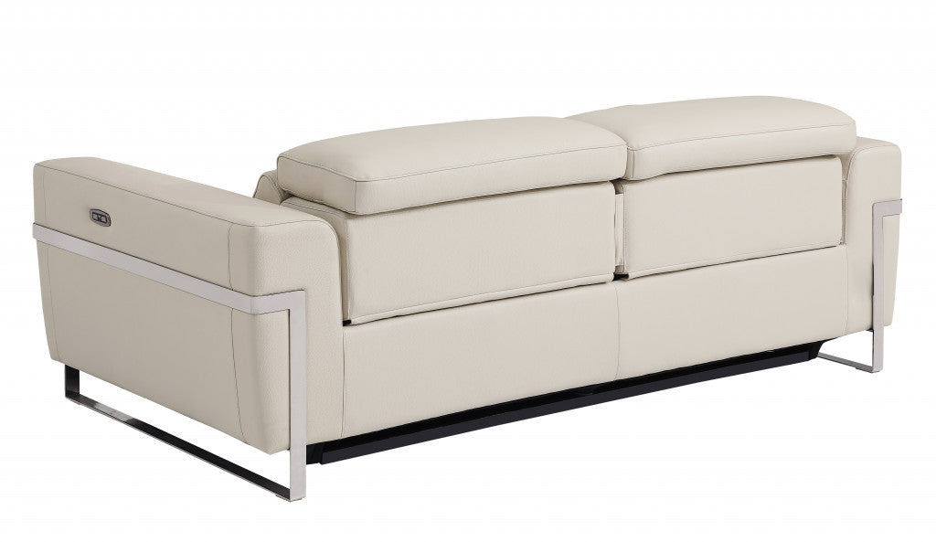 83" Beige Italian Leather and Chrome Reclining Sofa