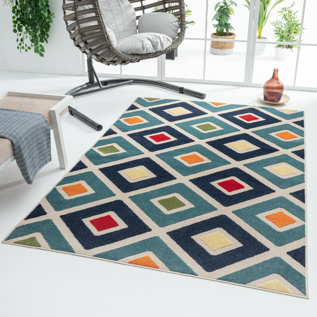 4' X 6' Blue And Ivory Geometric Stain Resistant Indoor Outdoor Area Rug