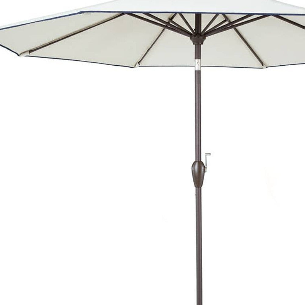 9' Beige And Navy Polyester Octagonal Tilt Market Patio Umbrella