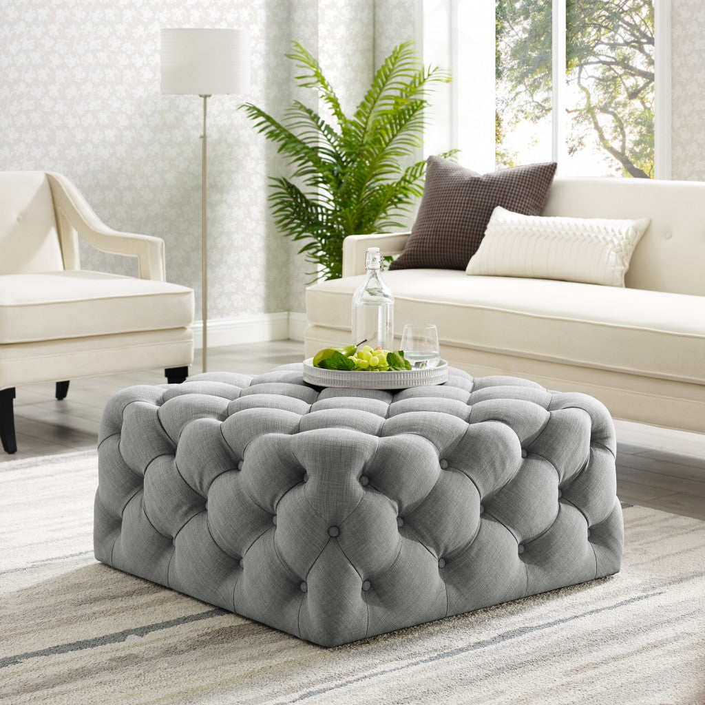 33" Light Gray Linen And Black Rolling Tufted Cocktail Ottoman