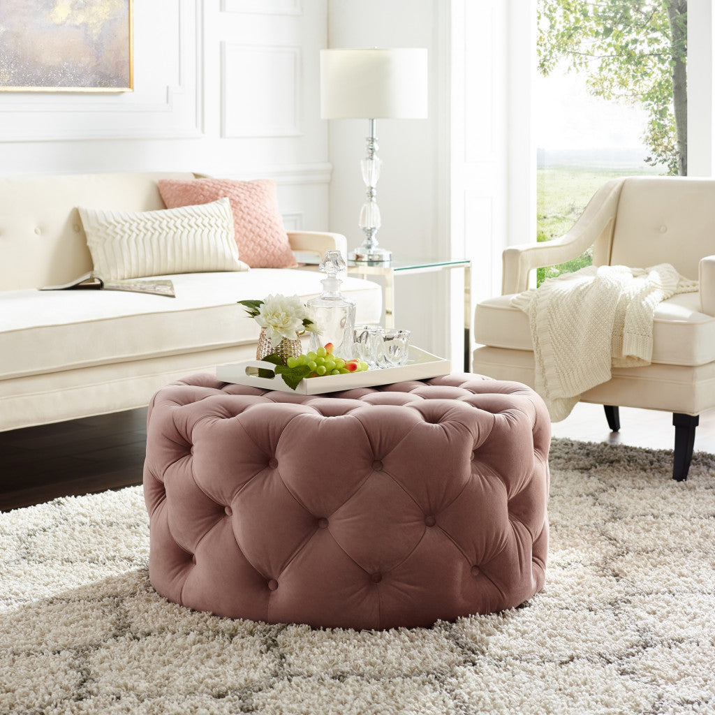 33" Blush Velvet And Black Rolling Tufted Round Cocktail Ottoman