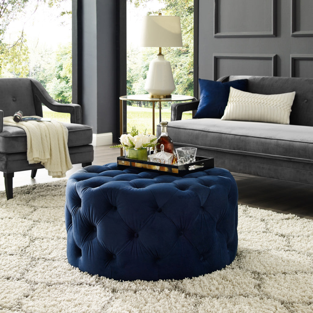 33" Navy Blue Velvet And Black Rolling Tufted Round Cocktail Ottoman