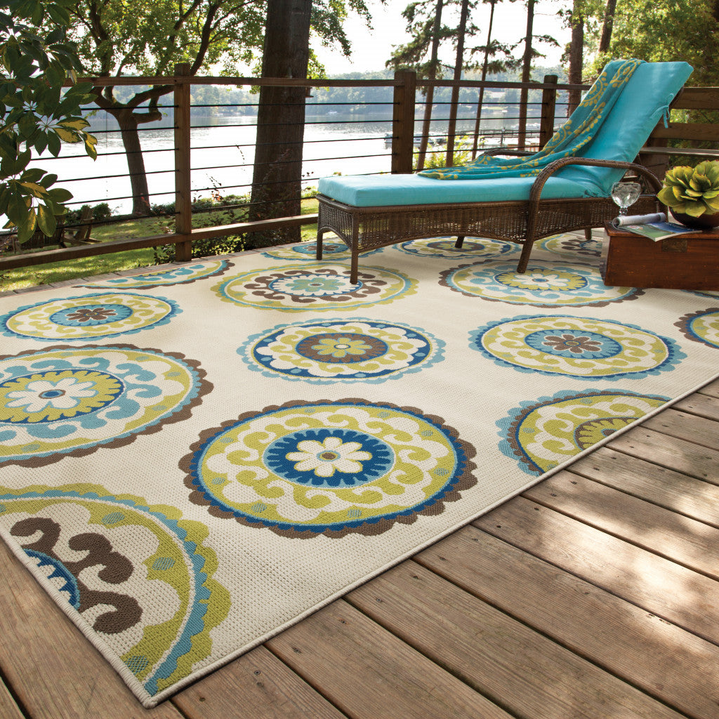 2' X 4' Green and Ivory Floral Stain Resistant Indoor Outdoor Area Rug