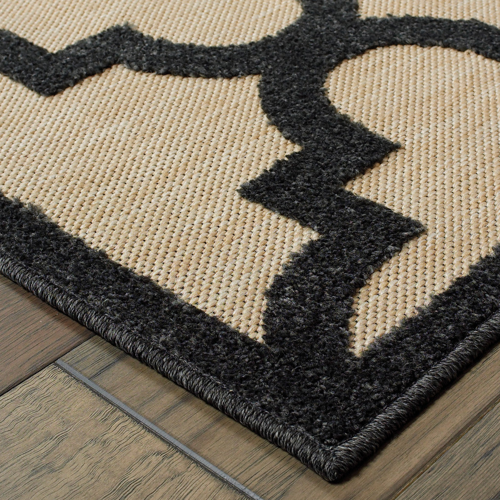 2' X 8' Beige and Black Geometric Stain Resistant Indoor Outdoor Area Rug