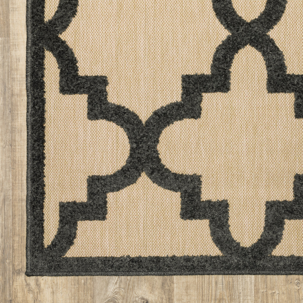 4' x 5' Beige and Black Geometric Stain Resistant Indoor Outdoor Area Rug