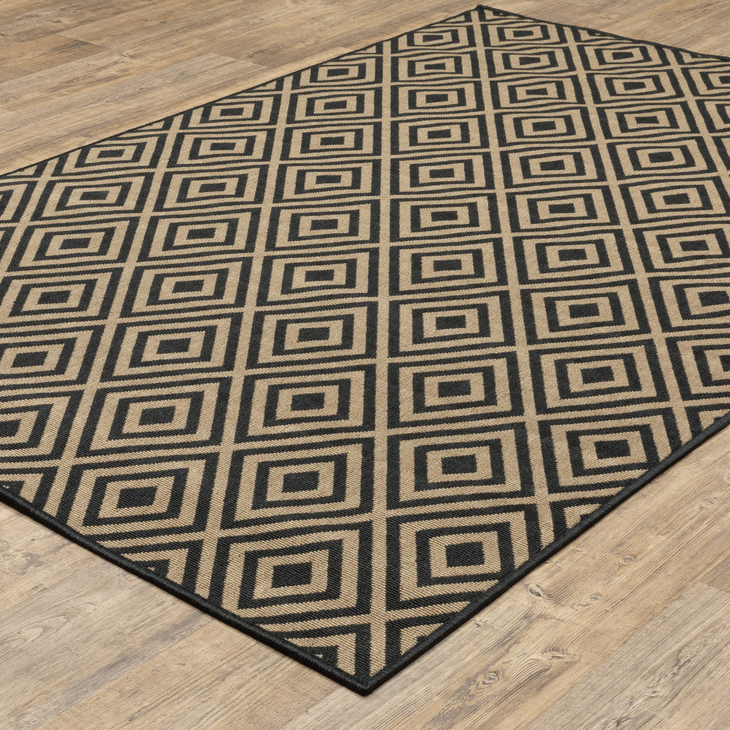 5' x 8' Black and Tan Geometric Stain Resistant Indoor Outdoor Area Rug